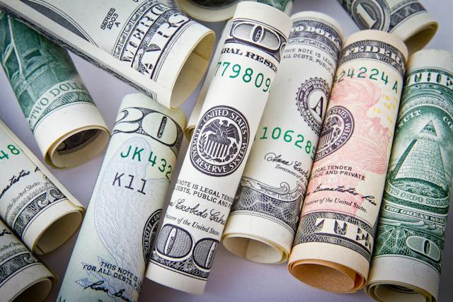 Several rolled up American bills.