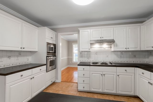 the interior of a bright, spacious kitchen