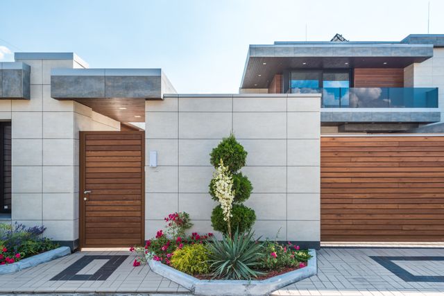 a modern home with an aesthetic curb