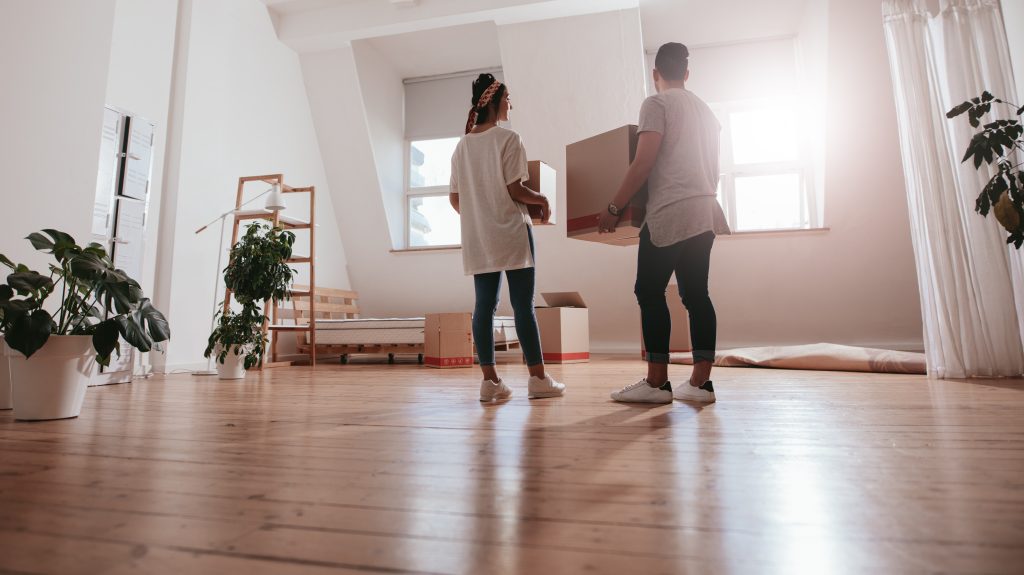 renters carrying in moving boxes